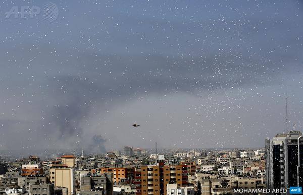 afp reports that flyers were dropped over gaza city yesterday, telling residents to evacuate
